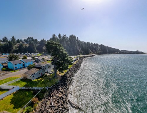 Walk around the point when tide is low to where the ocean meets the bay.