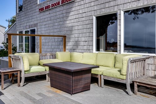 The fire pit adds some warmth to watching the coastal scene!