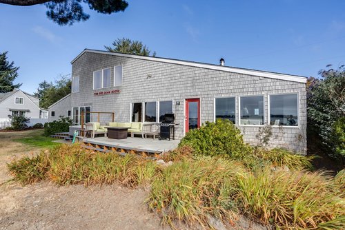 Let the kids play in the large fenced in yard while you relax in the hot tub.