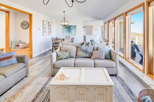The natural sunlit living area is great for friends and family to enjoy time together.