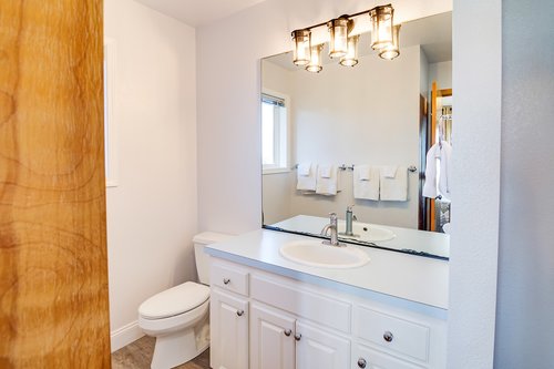 The primary bedroom ensuite bath has a shower that's convenient after a soak in the hot tub.