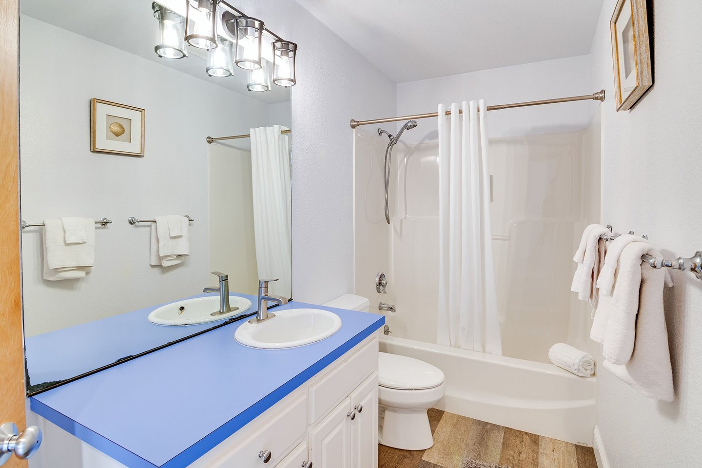 This shared bath is located next to the two bedrooms right down the hall.
