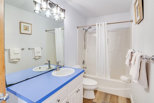 This shared bath is located next to the two bedrooms right down the hall.