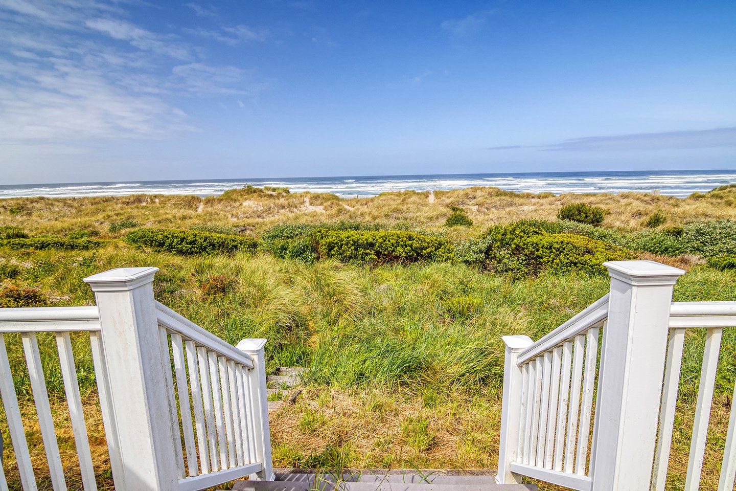Enjoy private beach access right off of your deck.