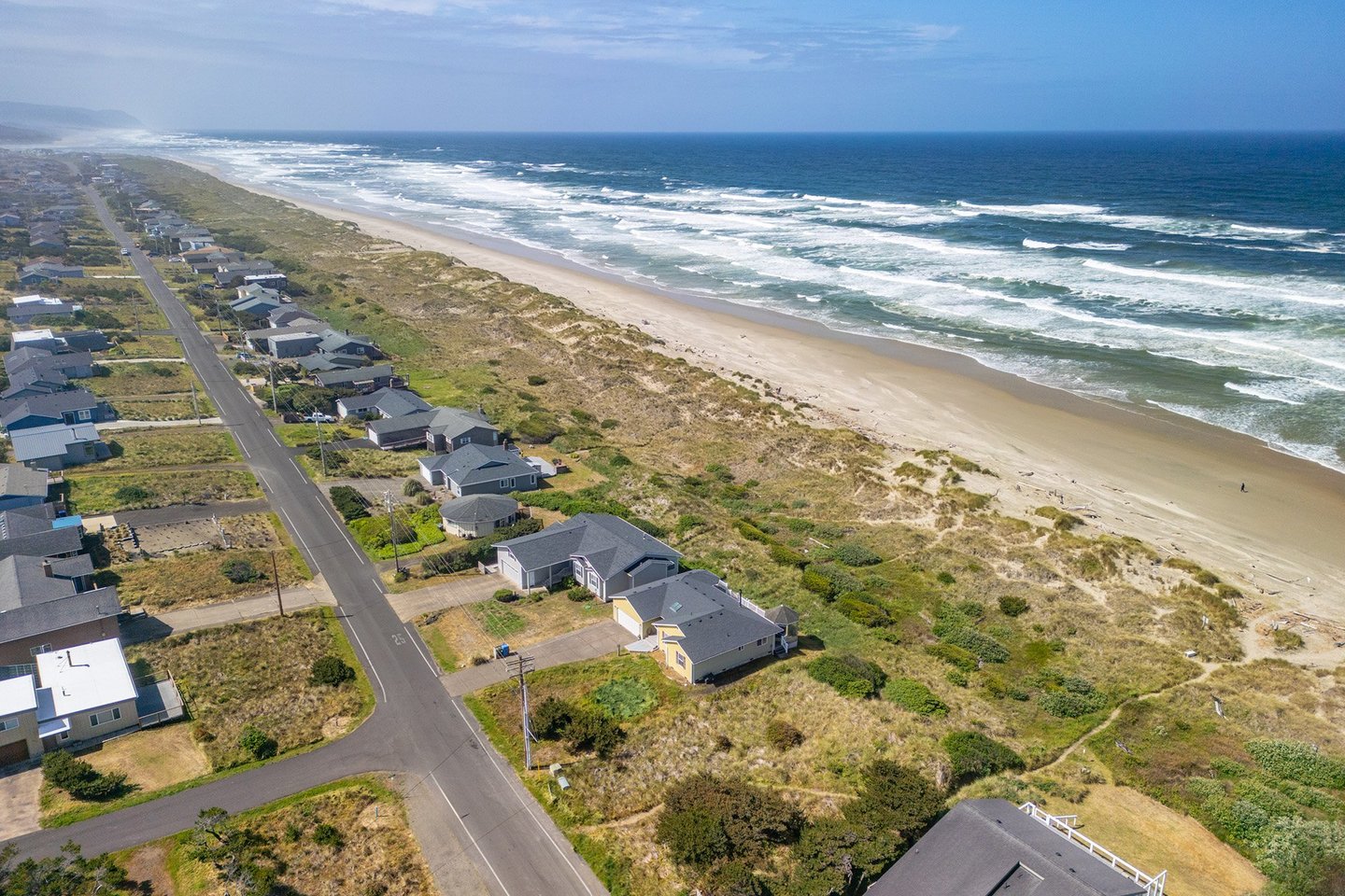 Miles of sandy beach are right in front of Beach Time and access couldn't be any easier