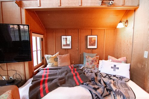 The built in bed is a perfect place to curl up!