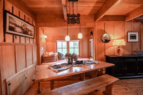 The large dining table with twin built in bed behind is great for dining or working!