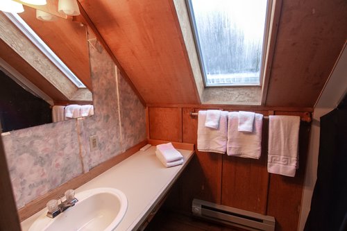 The upstairs bath is part of the loft bedroom.