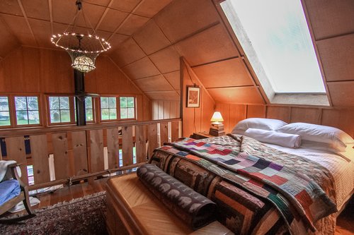 Queen bed in the loft is a perfect retreat.
