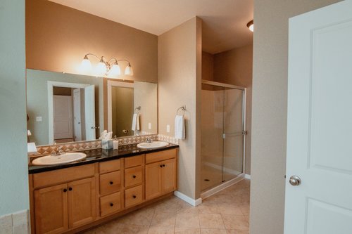 The double vanity and walk in shower is very spacious.