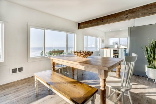Large table for family and friends to enjoy eating together.