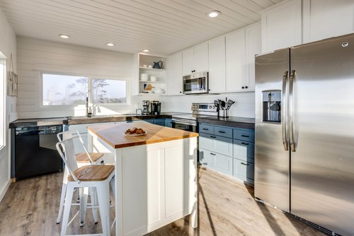 Plenty of space in the kitchen for family to gather.