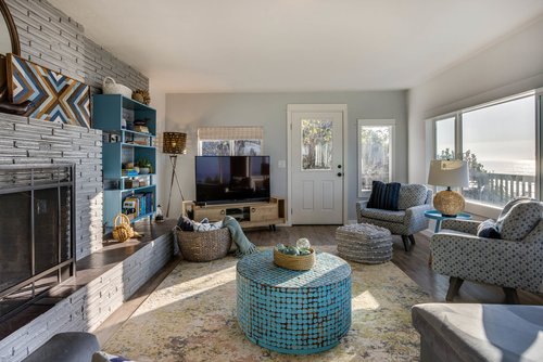 The door leads out to the ocean view deck.