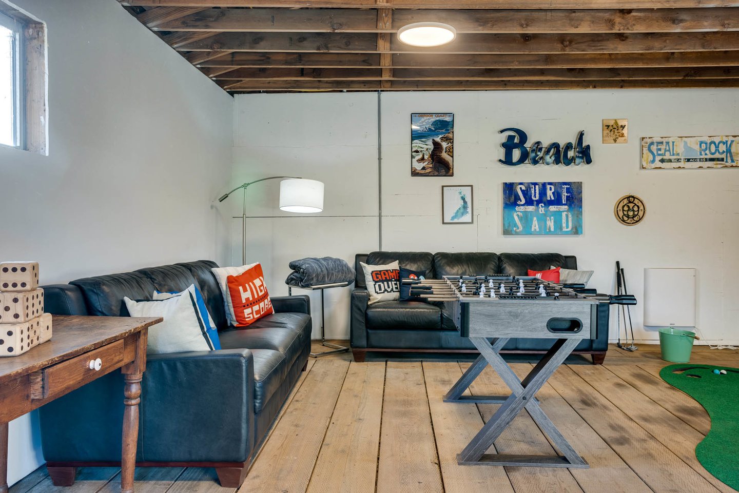 Seal Rock Cottage game room is separate from the house.