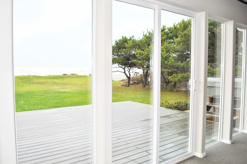 Large west facing windows make the room bright and airy.