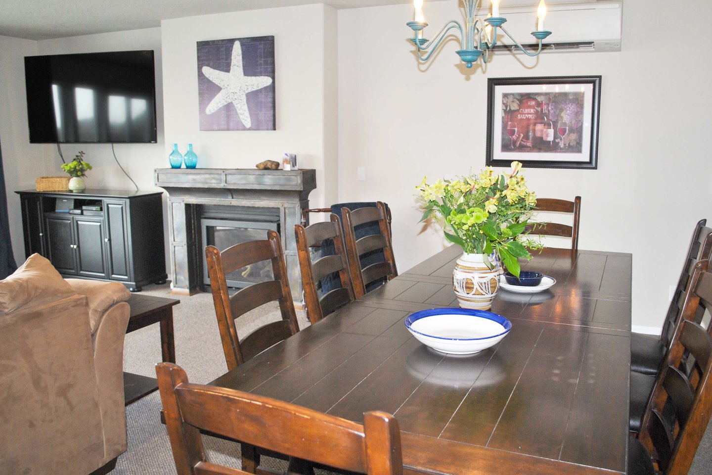Gather around the large dining table for meals or a card game.