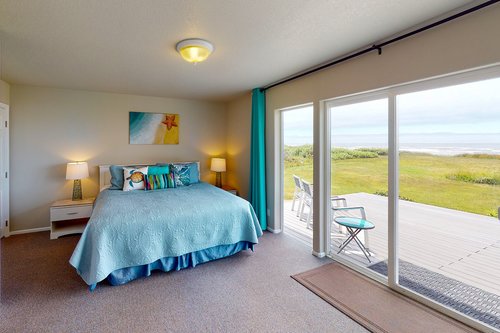 Beautiful ocean views and access to the deck from the primary bedroom.
