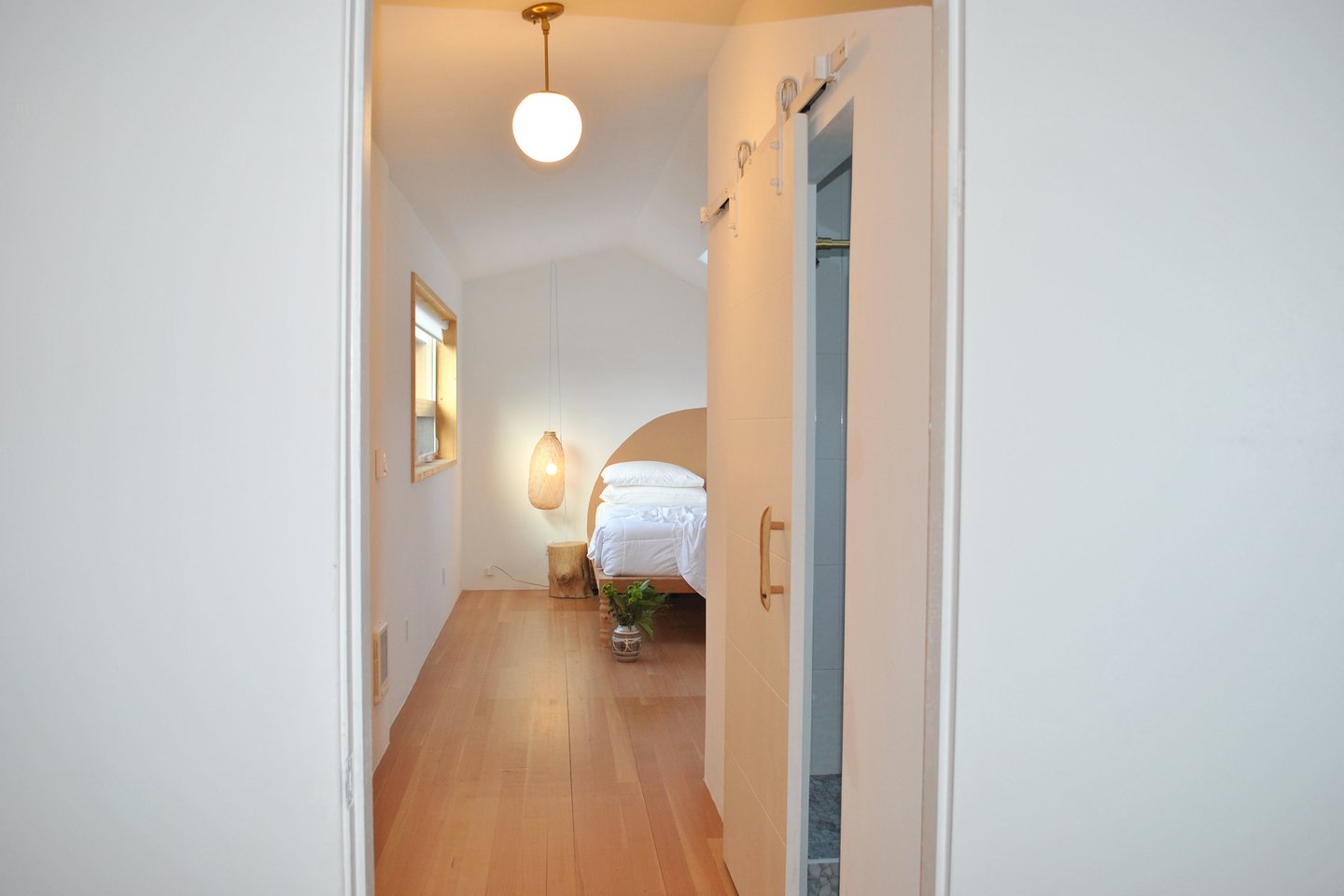 Enter into the primary bedroom.