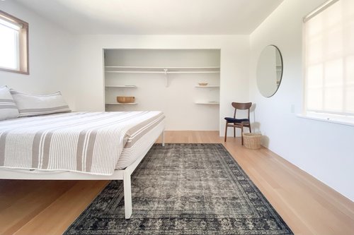 Enjoy the elegant simplicity of the main floor bedroom with king bed.