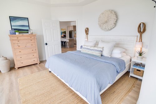 Lay in bed and watch the ocean.