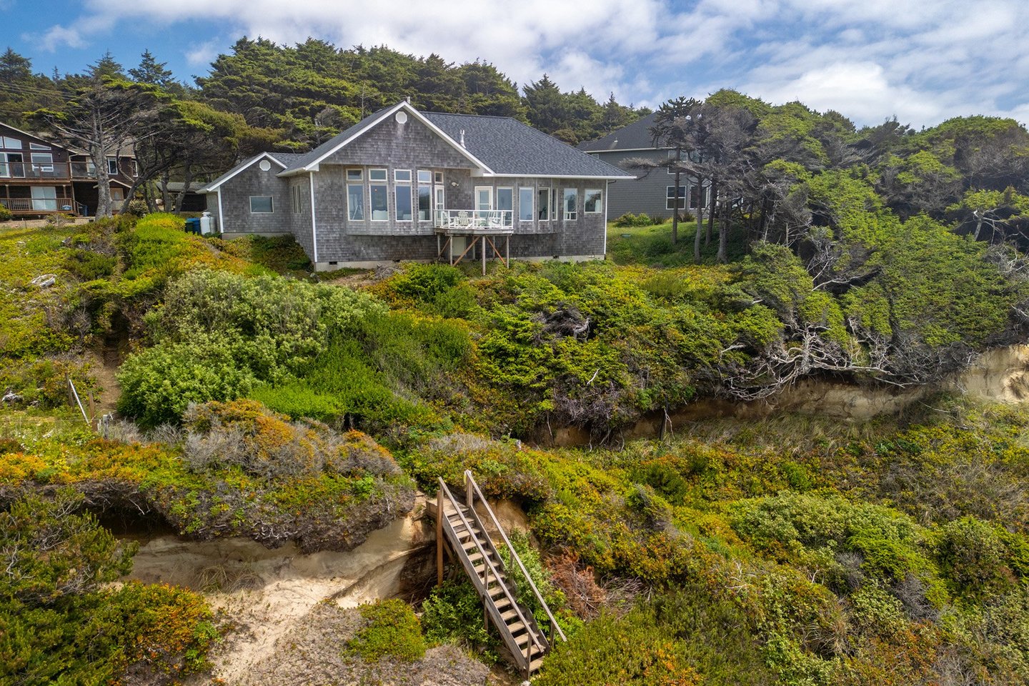 The Coastal Jewel is perfectly located just steps to a pristine sandy beach.