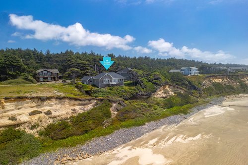 This beautiful home sits on a bluff overlooking the Pacific Ocean.