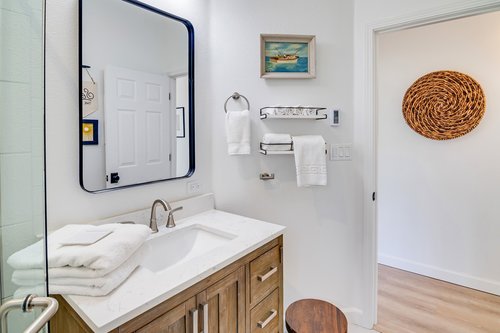 The hall bathroom as plenty of space for storage.