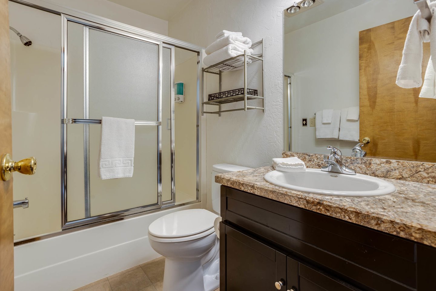 The bedroom has an ensuite bath for added privacy.