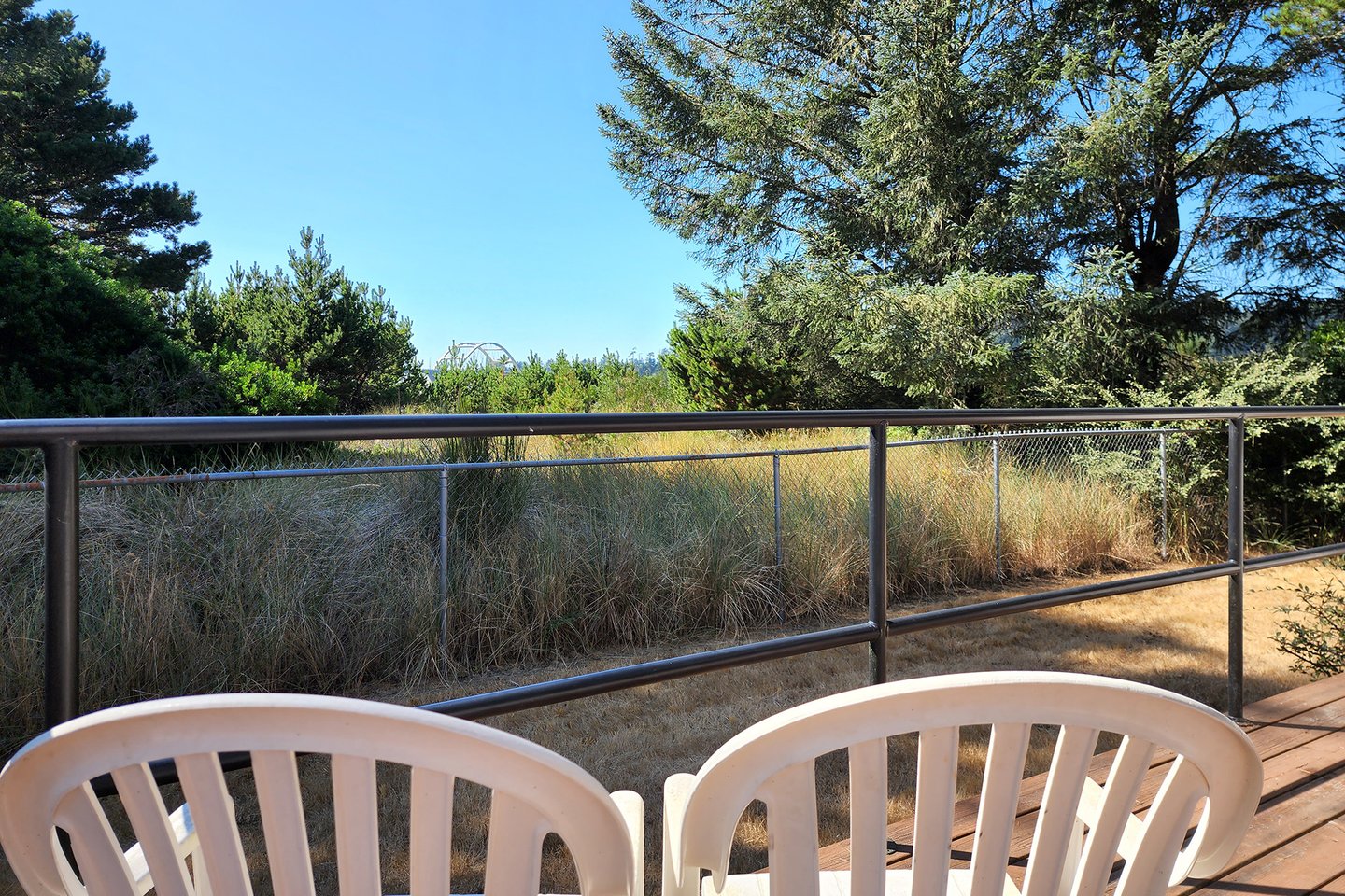 Enjoy the peace and quiet of the outdoors with a view of the bridge.