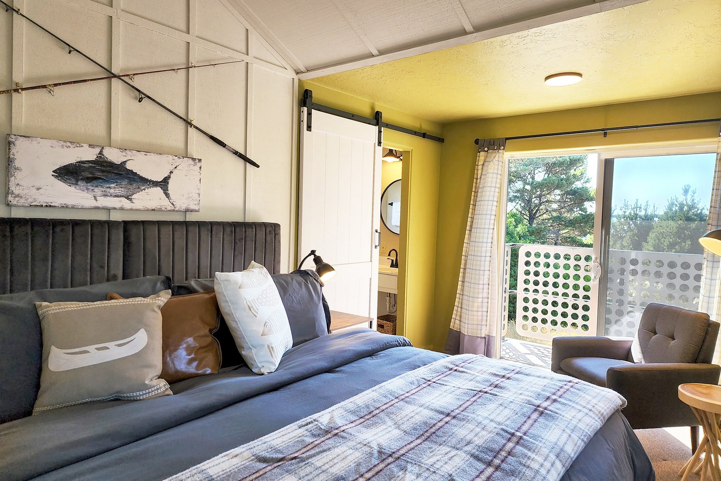 The sliding glass door leads to a balcony and bridge views.