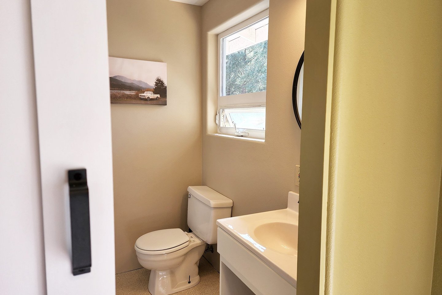 Half bath attached to the bedroom allows for extra privacy.