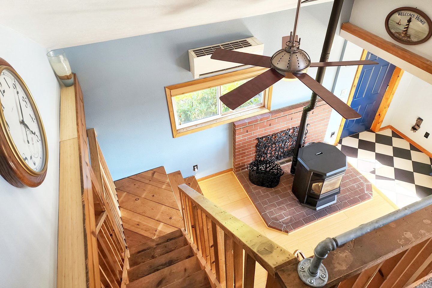 Stairs up to the loft and second bedroom.