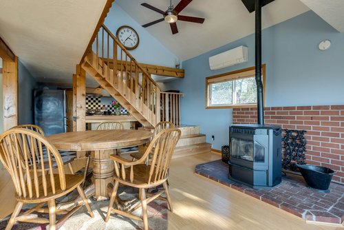 The pellet stove adds ambience to this charming home.
