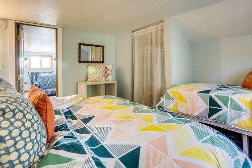 Cozy up in the queen bed in the second floor bedroom.