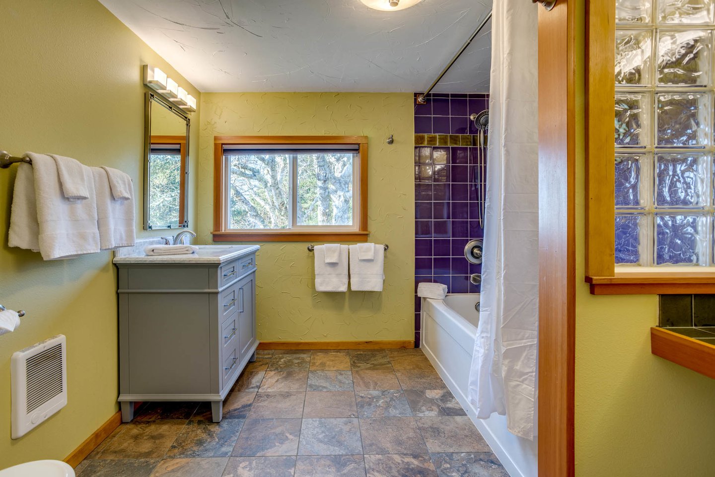 Light and airy with a tub/shower combination.