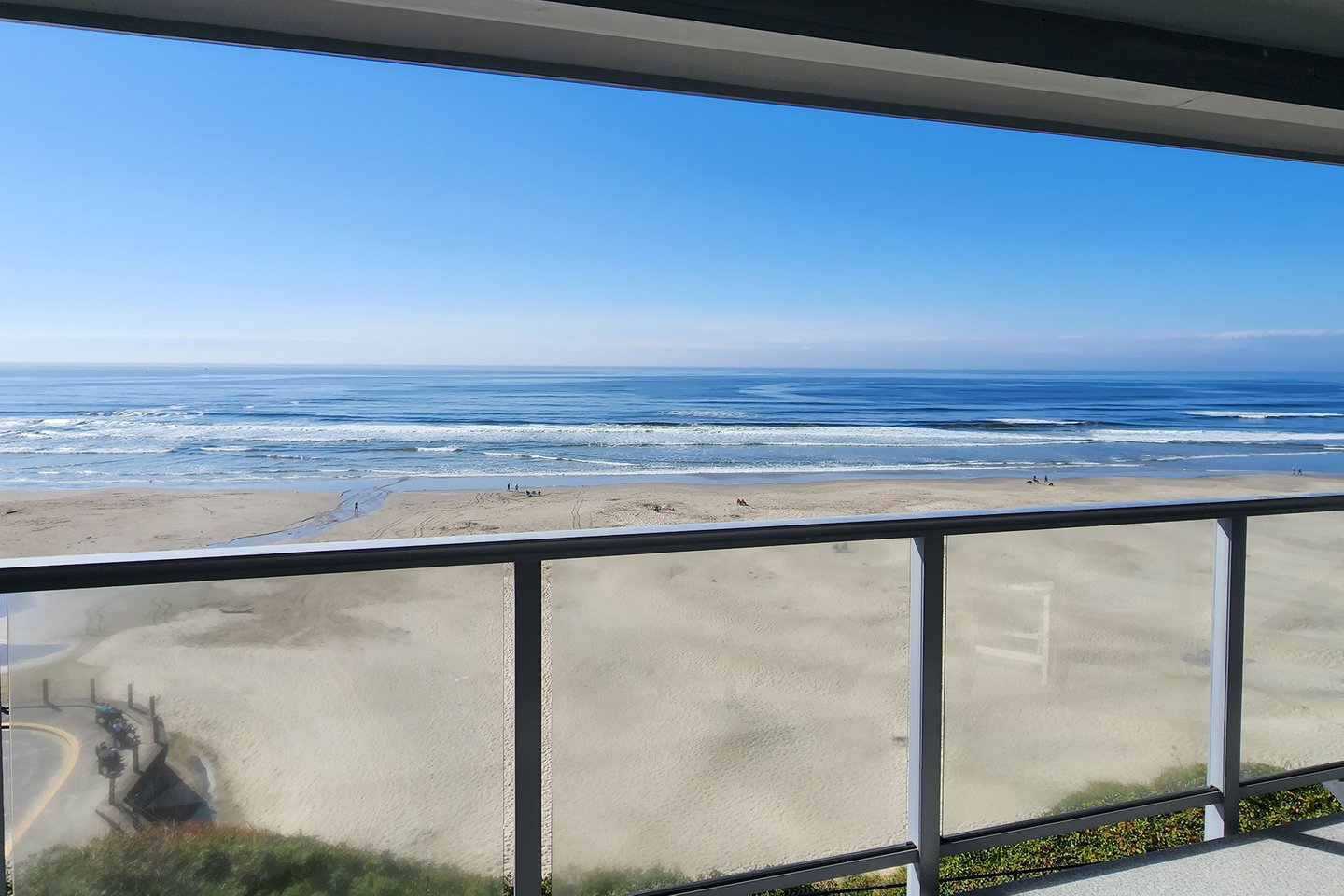 This covered patio deck is perfect for wave and people watching.