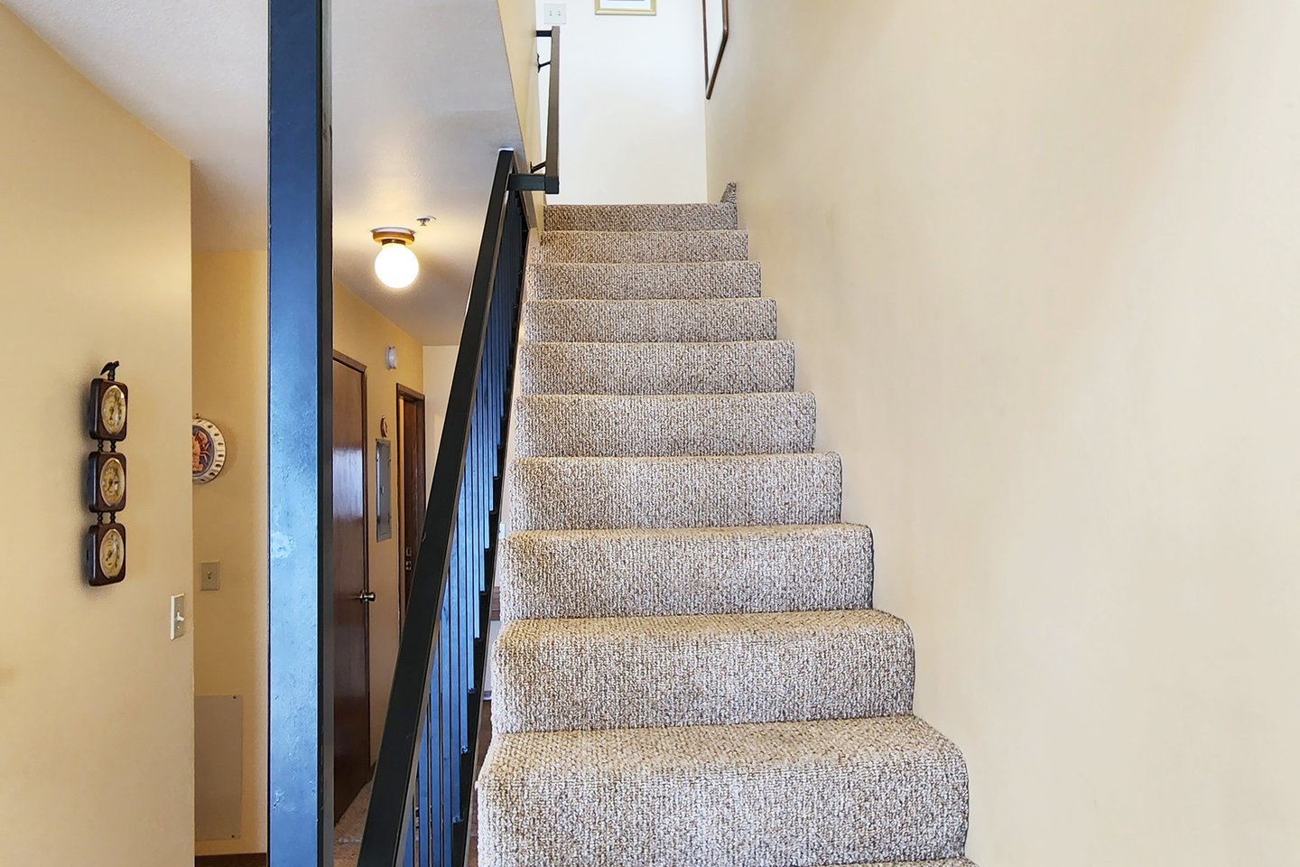 Upstairs to the master ensuite bed and bath.