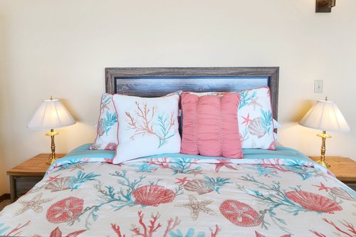 Enjoy this queen bed during your stay.