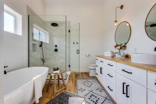 The primary bedroom ensuite is like walking into a spa.