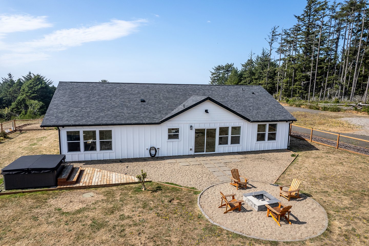 Fenced yard is perfect for family, kids and dogs! Also with a hot tub.