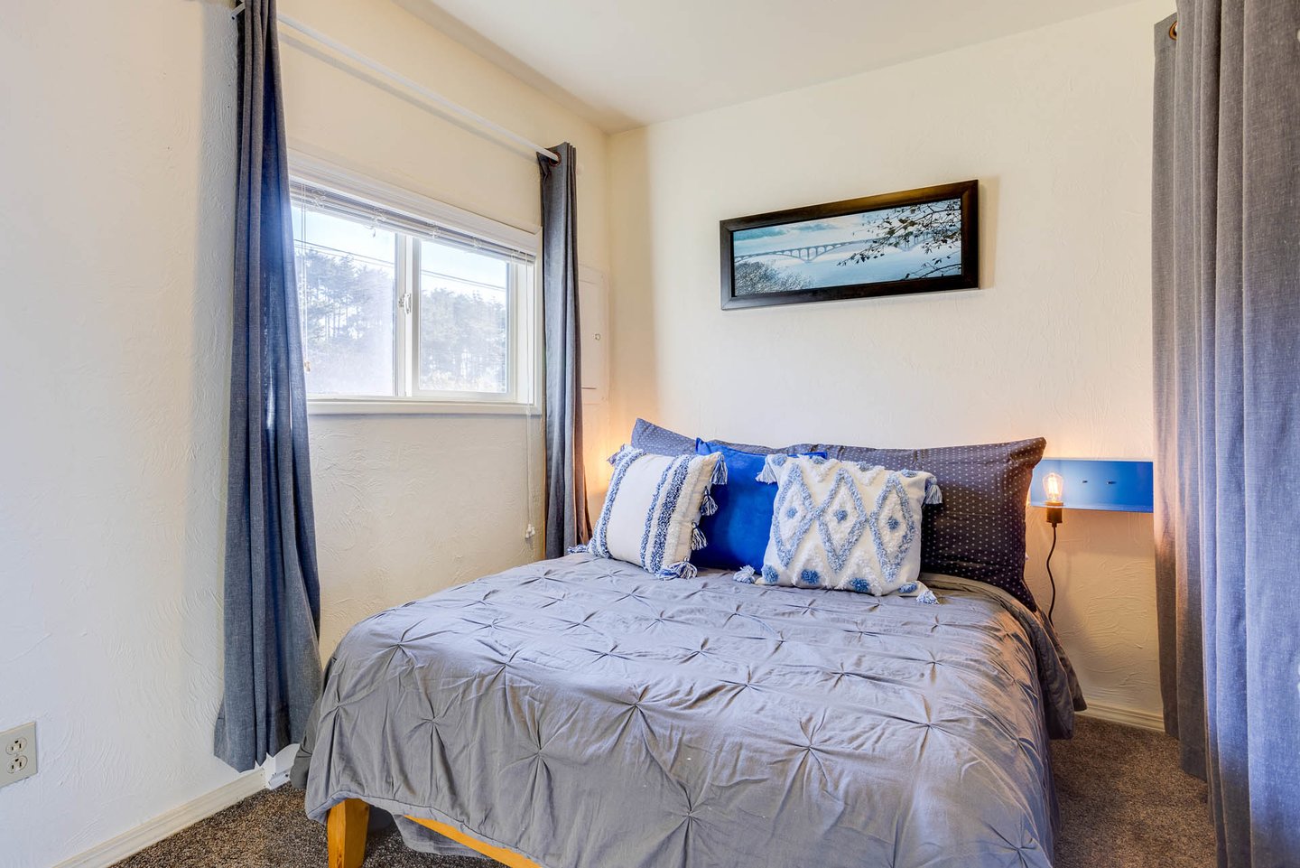 The second bedroom has a full bed.