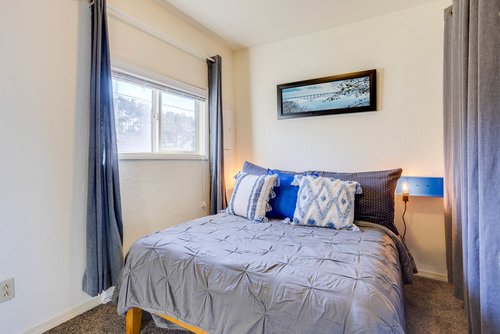The second bedroom has a full bed.