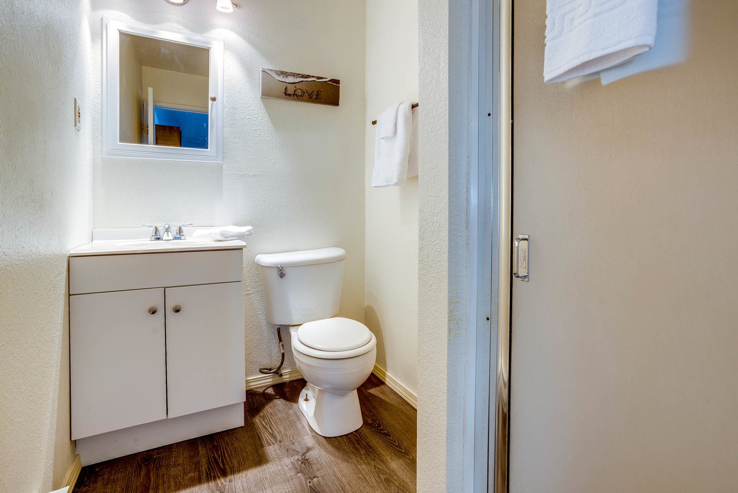 A shared bath in the hallway.