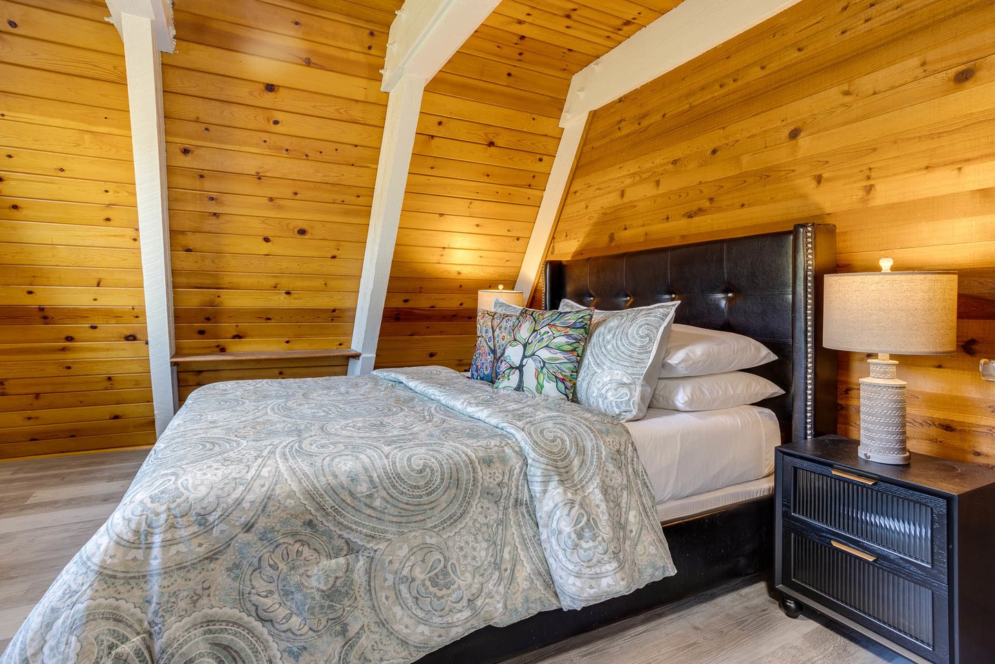 Comfortable bedroom on the main level with a queen bed.