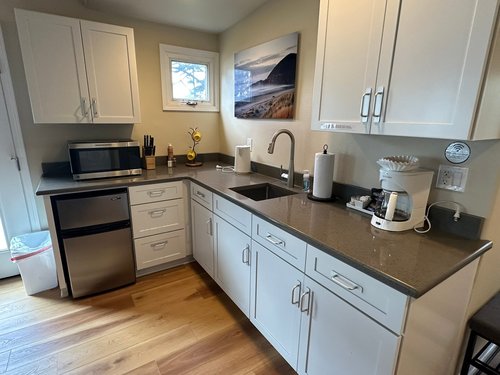 Kitchenette is equipped with enough for a tasty meal.