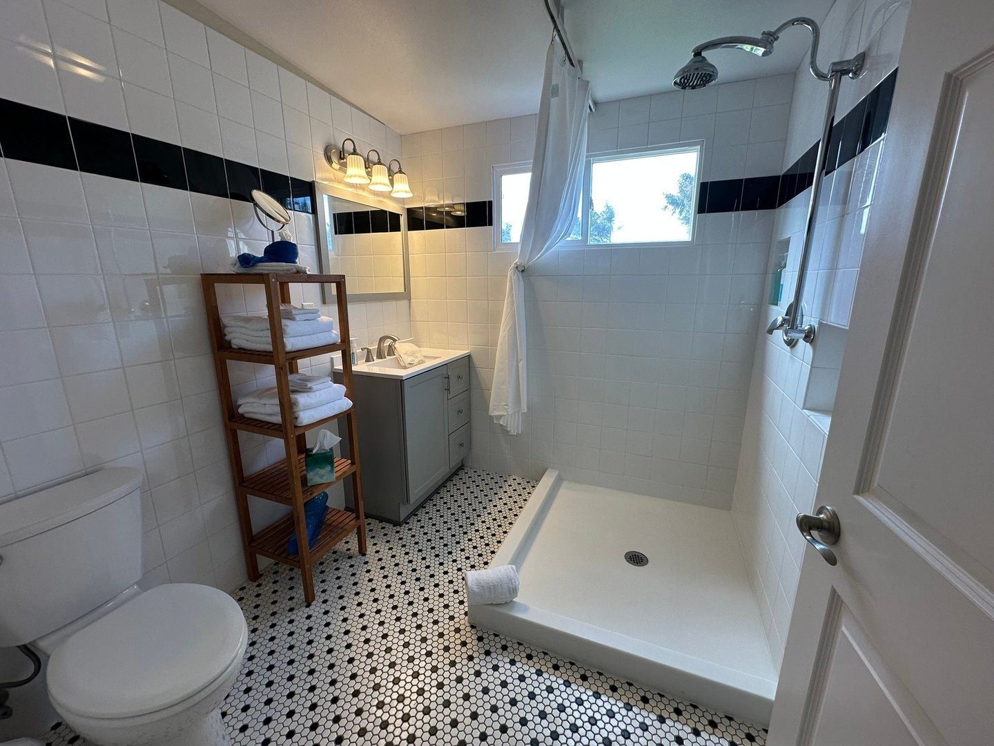 The bath with a shower.