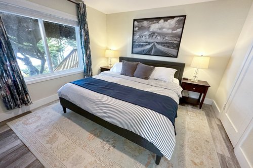 Comfy king bed in the bedroom.