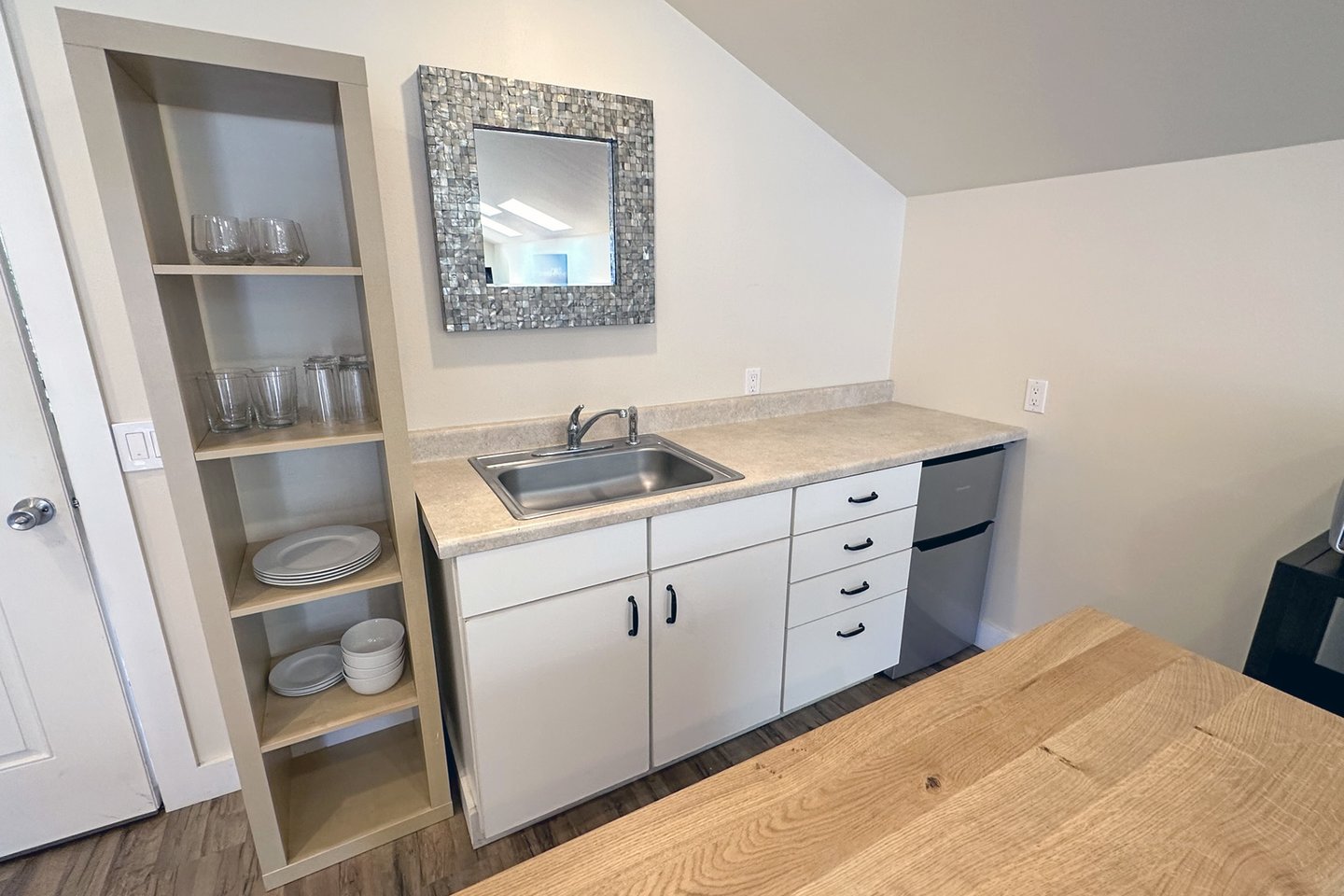 Kitchenette is equipped with enough for a tasty meal.