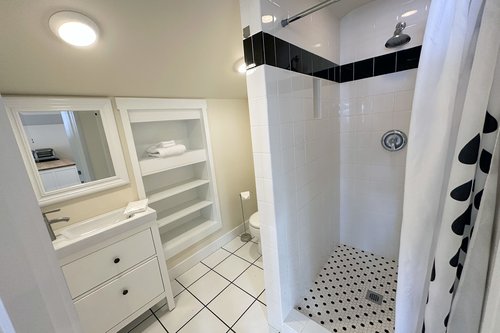 A full bath with walk in shower.