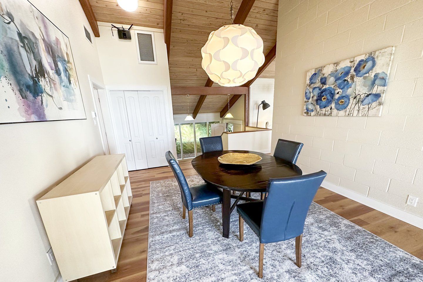 Separate dining area on the other side of the fireplace.